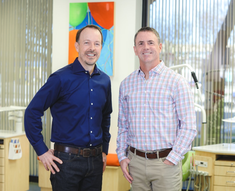 Dr. Bryan Elvebak with fellow orthodontist at Elvebak Orthodontics in Plano, TX, providing expert orthodontic care including braces and Invisalign.