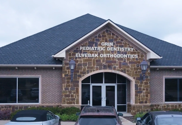 Reception area of Elvebak Orthodontics dental office in Plano with warm lighting and welcoming décor.